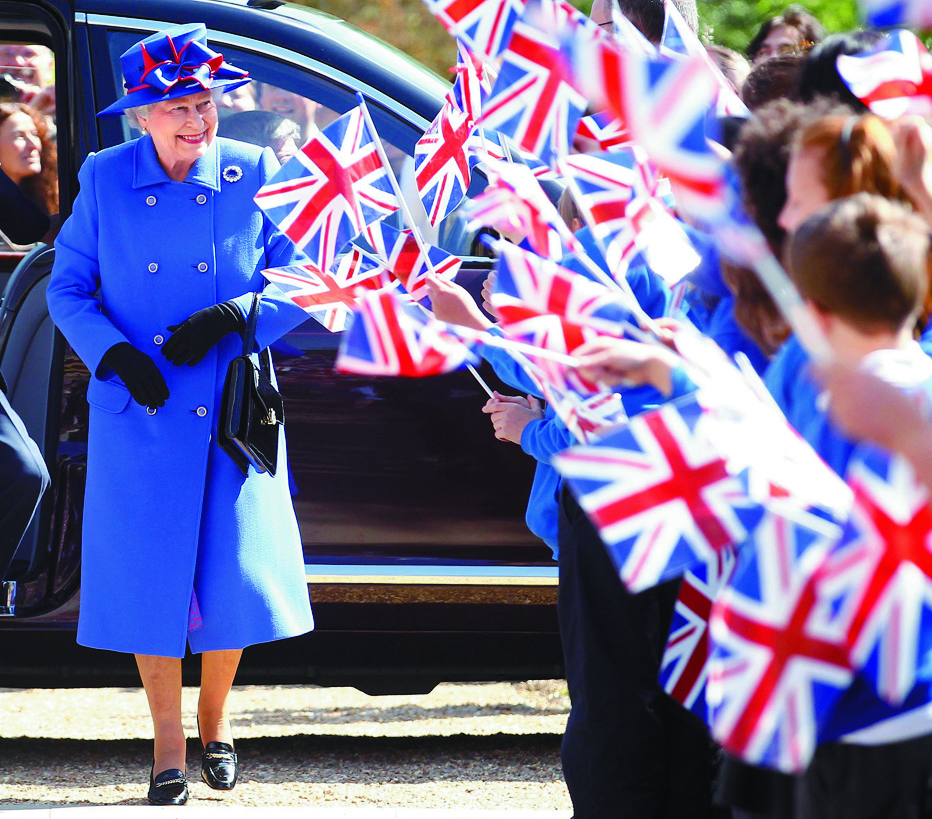 Britain's Queen Elizabeth arrives to open the Sainsbury Laboratory for Plant Sciences in the University of Cambridge Botanic Garden, in Cambridge, southern England April 27, 2011. REUTERS/Andrew Winning (BRITAIN - Tags: ENTERTAINMENT SOCIETY ROYALS)